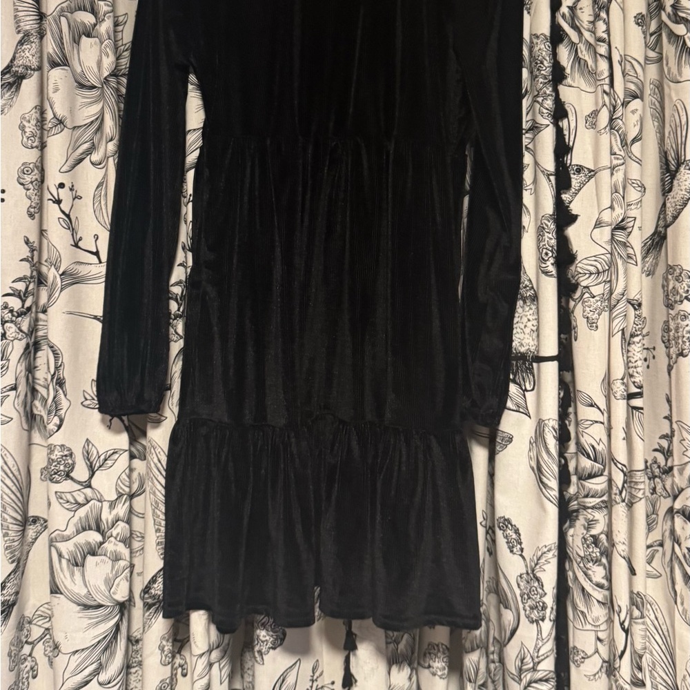 2 black holiday dresses: 1 long and one hits at knee